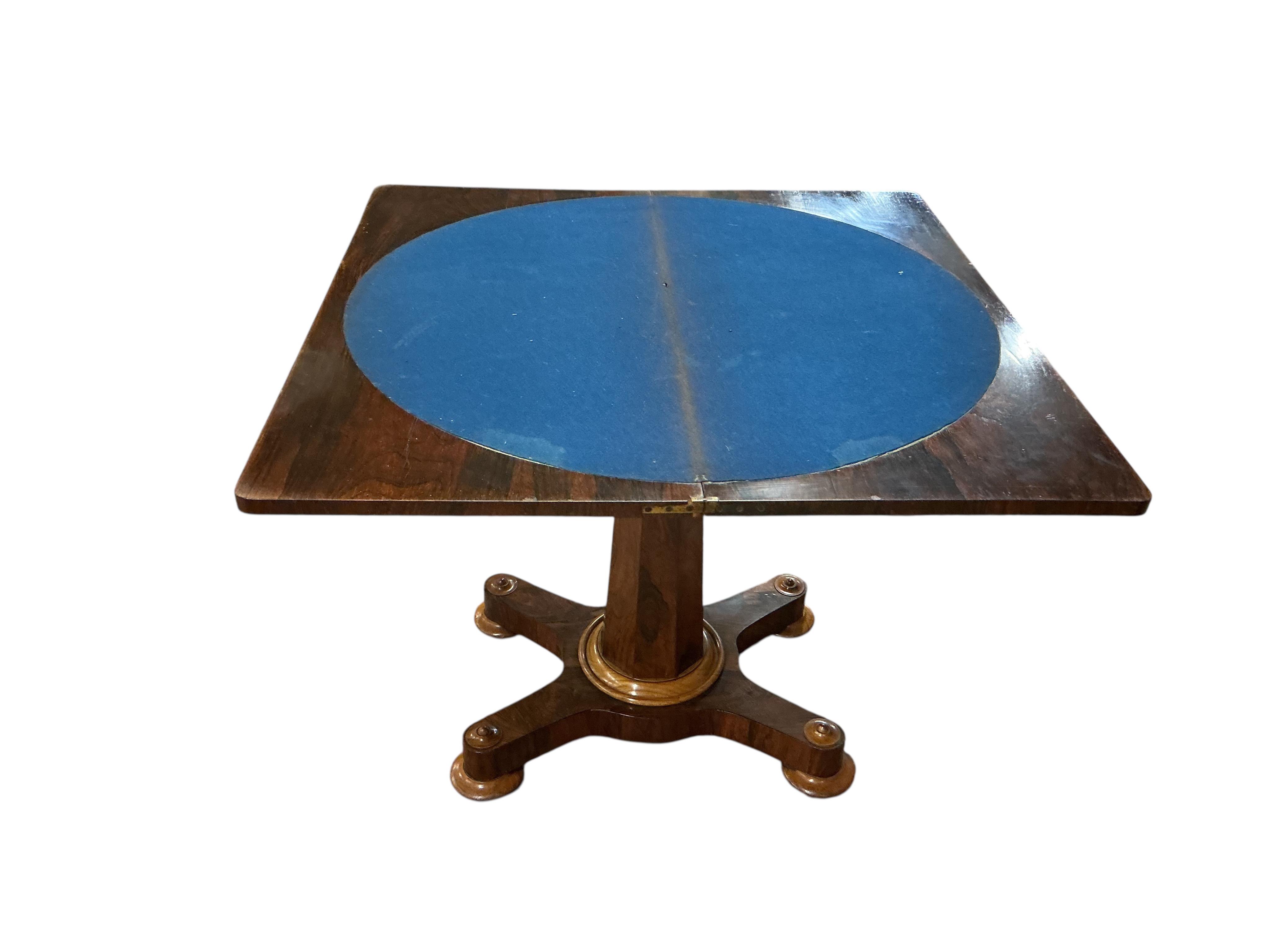 An early Victorian rectangular rosewood folding card table, width 91cm, depth 45cm, height 77cm